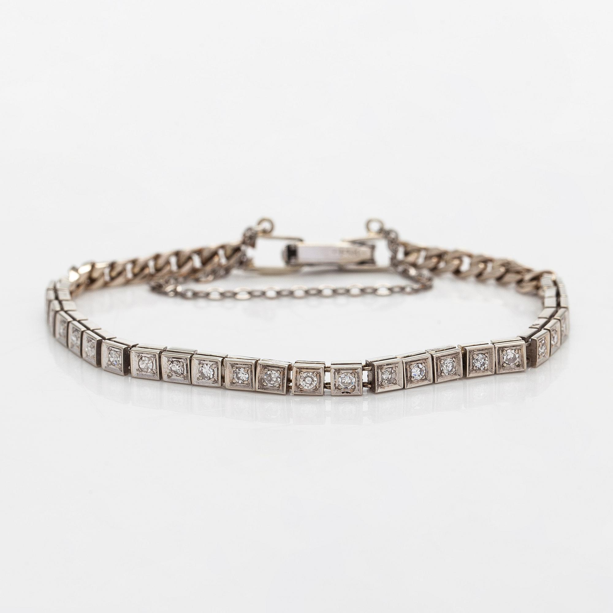 Rannekoru, 14K valkokultaa, 8/8 hiottuja timantteja.