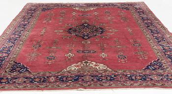An oriental/eastern European carpet, c. 355 x 275 cm.