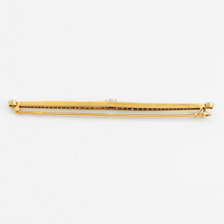 Brosch, gold with old-cut diamonds and princess-cut sapphires.