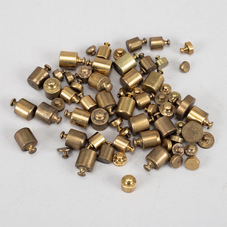A large collection of ca 120 brass weights, 19th/20th century.