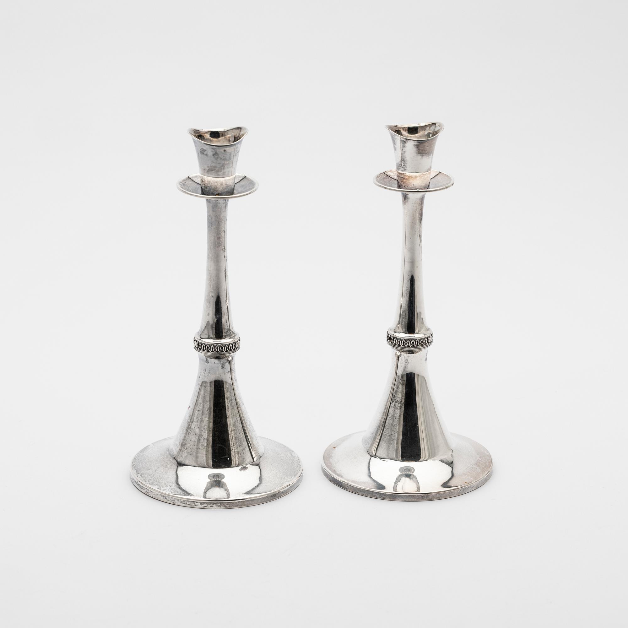 Candelsticks, a pair, silver, MGAB, Uppsala, 1964.