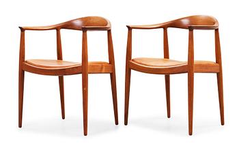 2. A pair of Hans J Wegner teak 'The Chair' by Johannes Hansen, Denmark, 1950-60's.