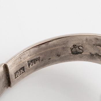 Ring, Strömdahls, with a cabochon-cut ruby and brilliant cut diamonds.