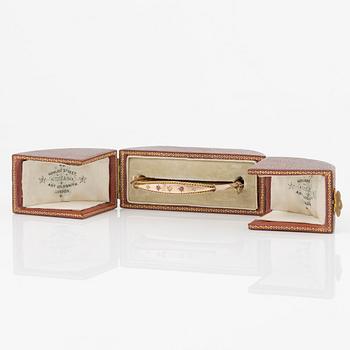 Armring, 9K guld med små diamanter och rubiner, sent 1800-tal/tidigt 1900-tal.