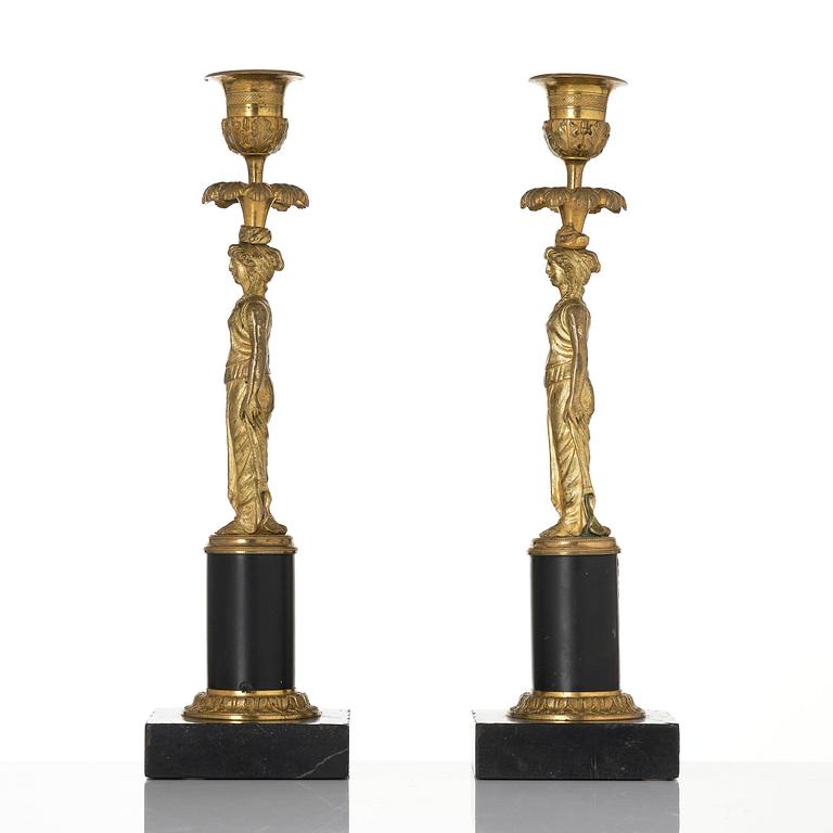 A pair of late Gustavian marble and ormolu candlesticks attributed to F. L. Rung (1758-1837).