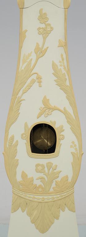 A Carl Malmsten painted and carved floor clock.