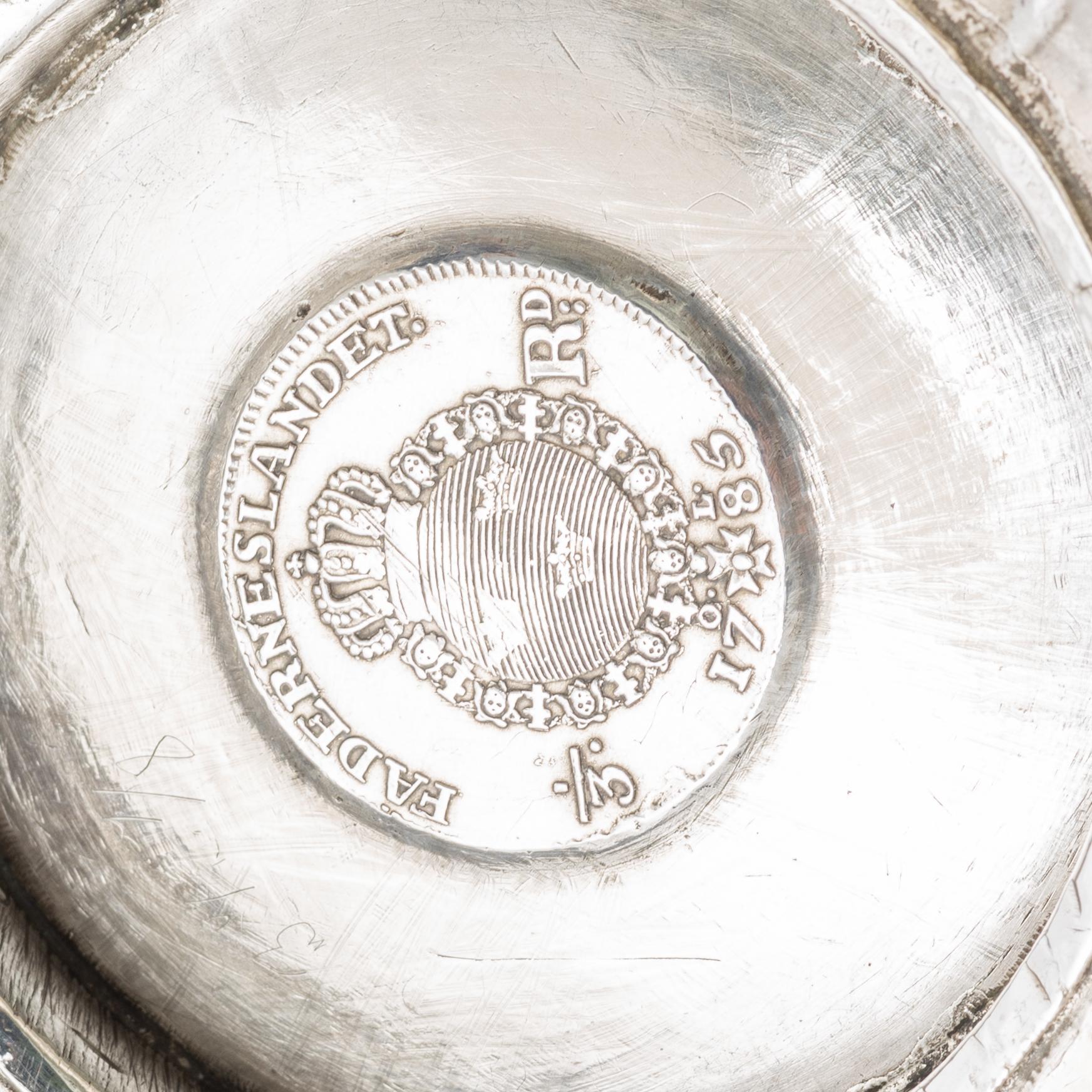 A silver beaker by Erik Ernander, Uppsala, 1809.