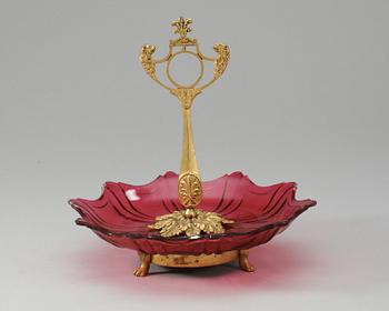 24. A 19th Century glass and bronze cakedish.