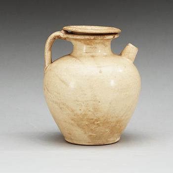 A cream glazed ewer with cover, Tang dynasty (618-907).