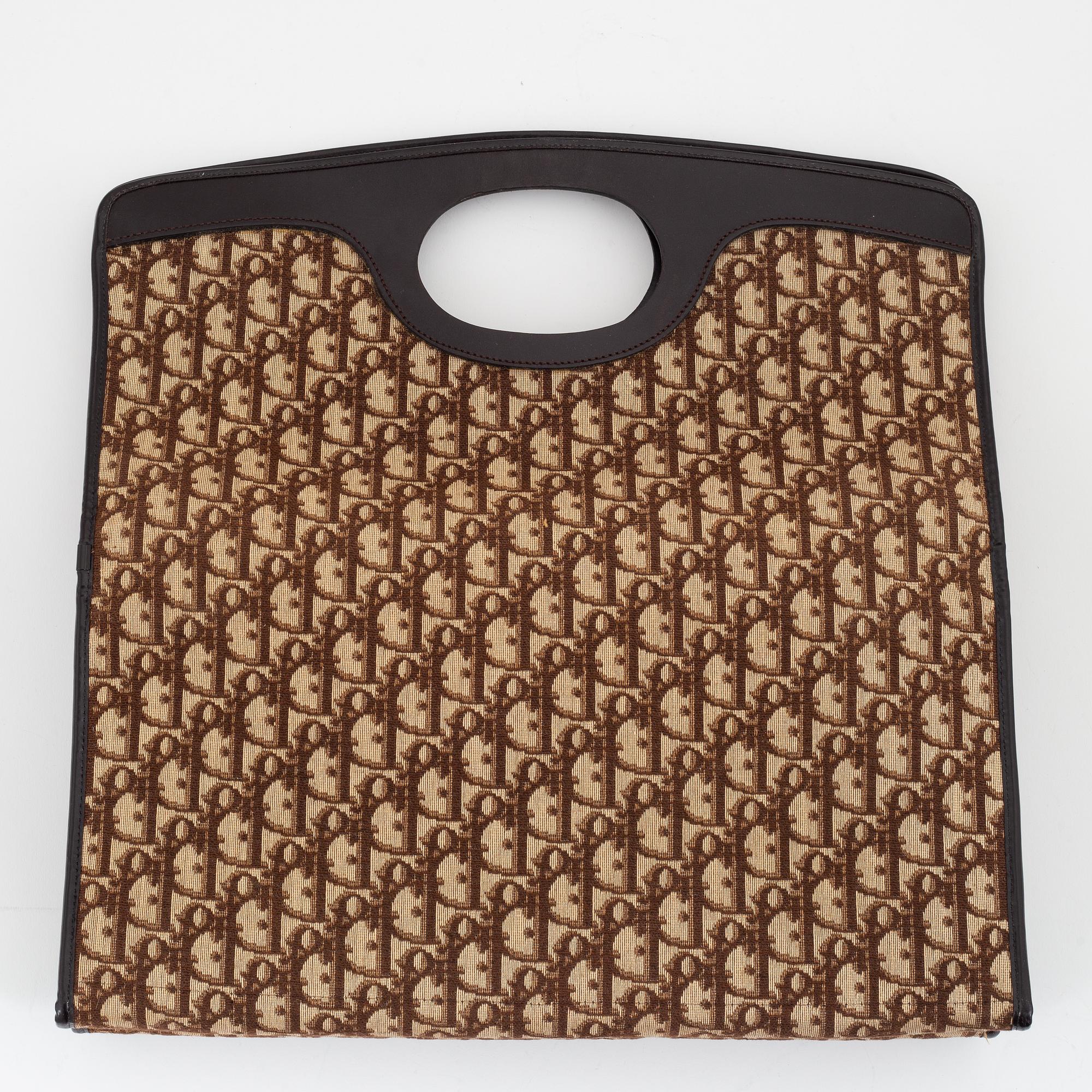 Christian Dior, a canvas tote bag.