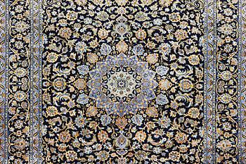A carpet, Kashan, c. 393 x 297 cm.