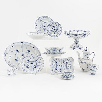 A 56 piece dinner and coffee service, half lace 'Musselmalet', Royal copenhagen, Denmark.