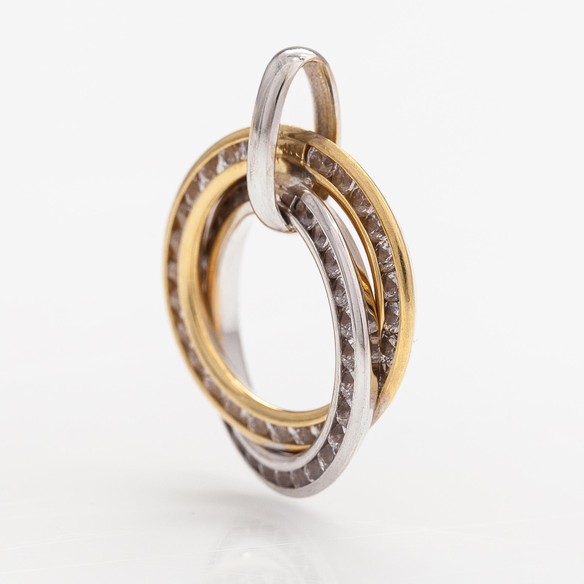 An 18K gold pendant with diamonds ca. 0.50 ct in total.