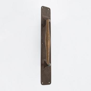 An Art Nouveau door handle from early 20th century.