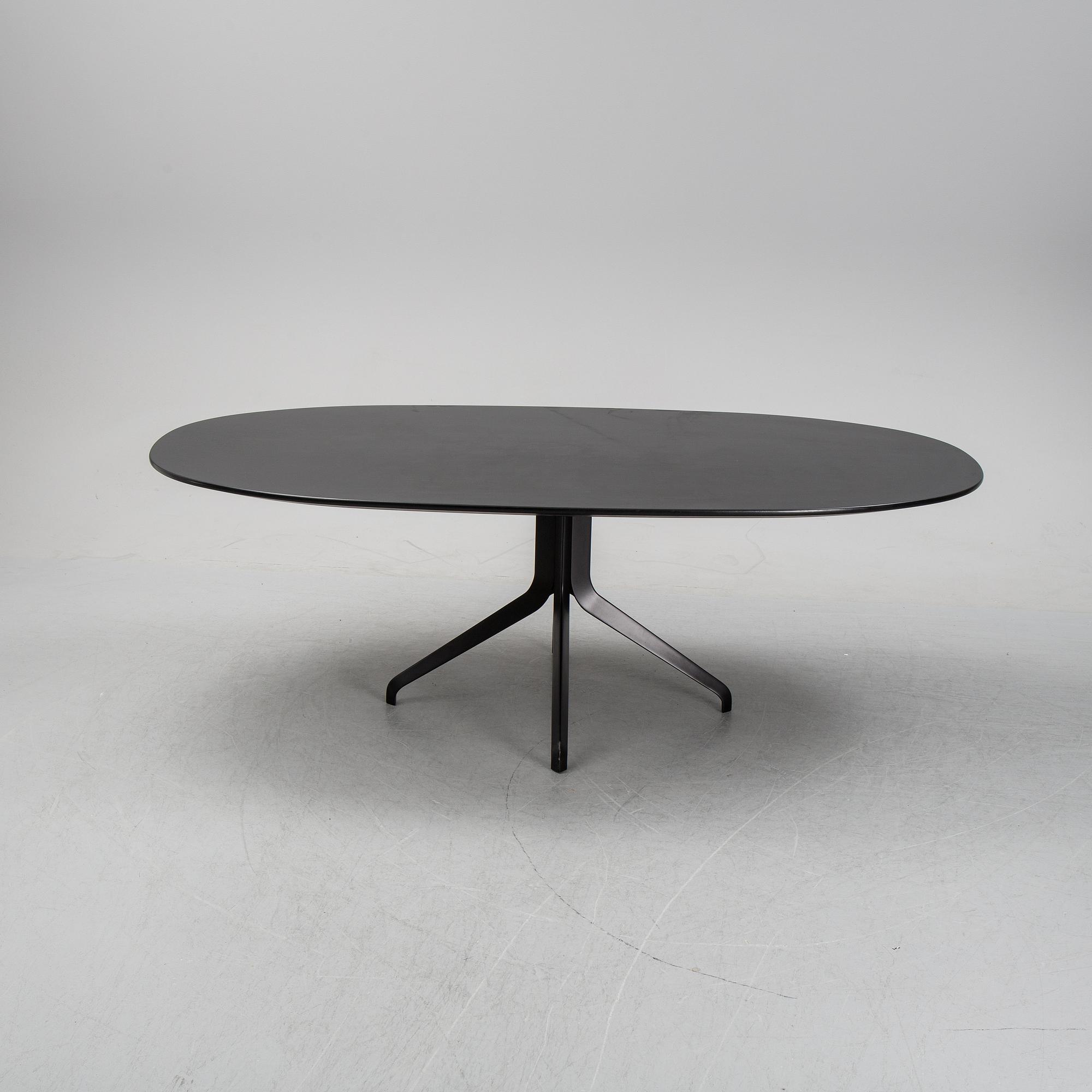 Rodolfo Dordoni, a 'Claydon' dining table, Minotti, Italy.