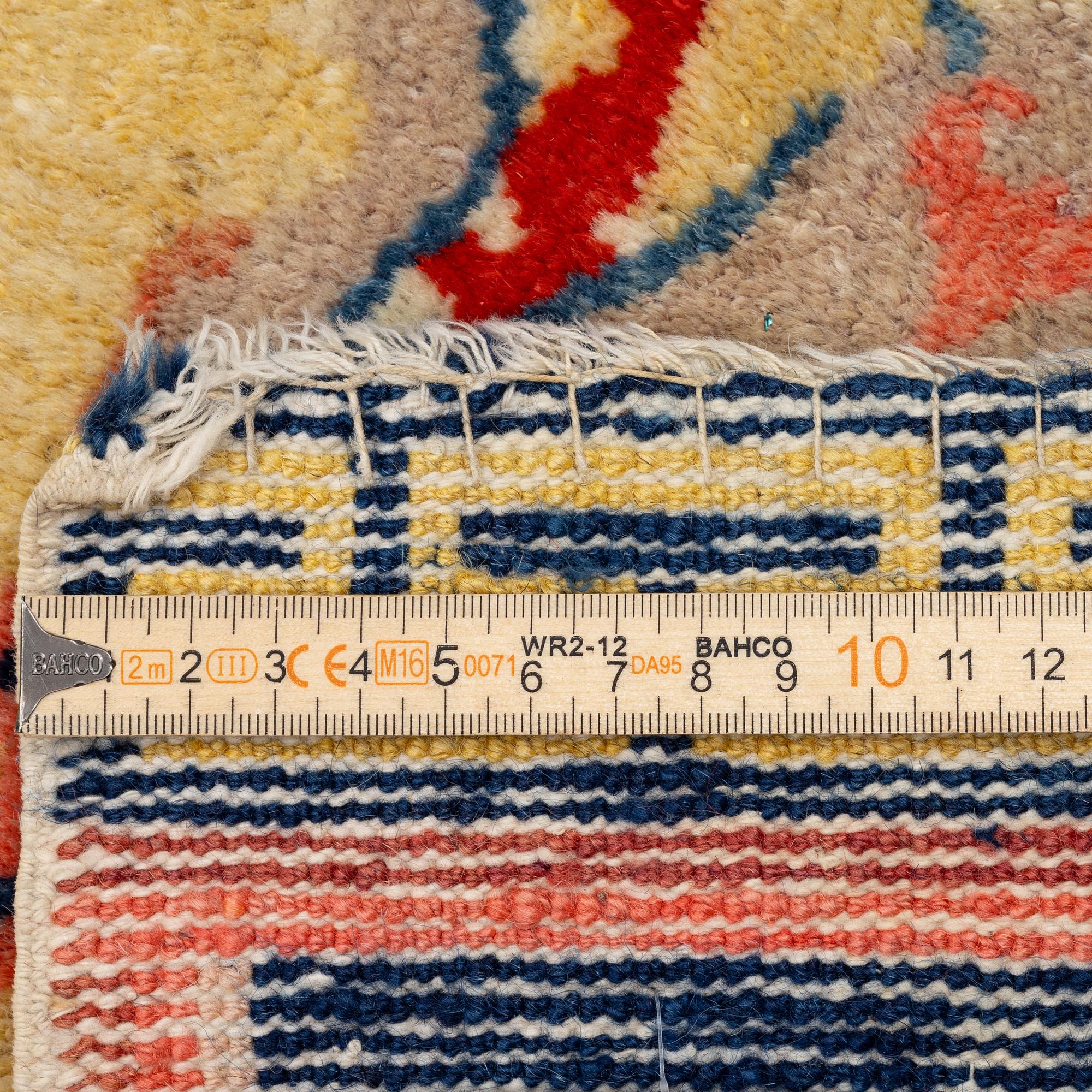 A Ningxia banner rug, Northern China, late Qing dynasty, c. 230x222 cm.