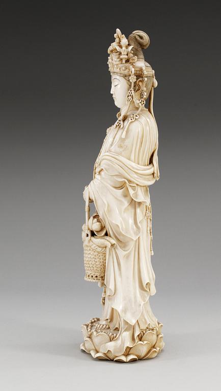 A Japanese ivory figure of Guanyin, probably Meiji period (1868-1912). Signed.