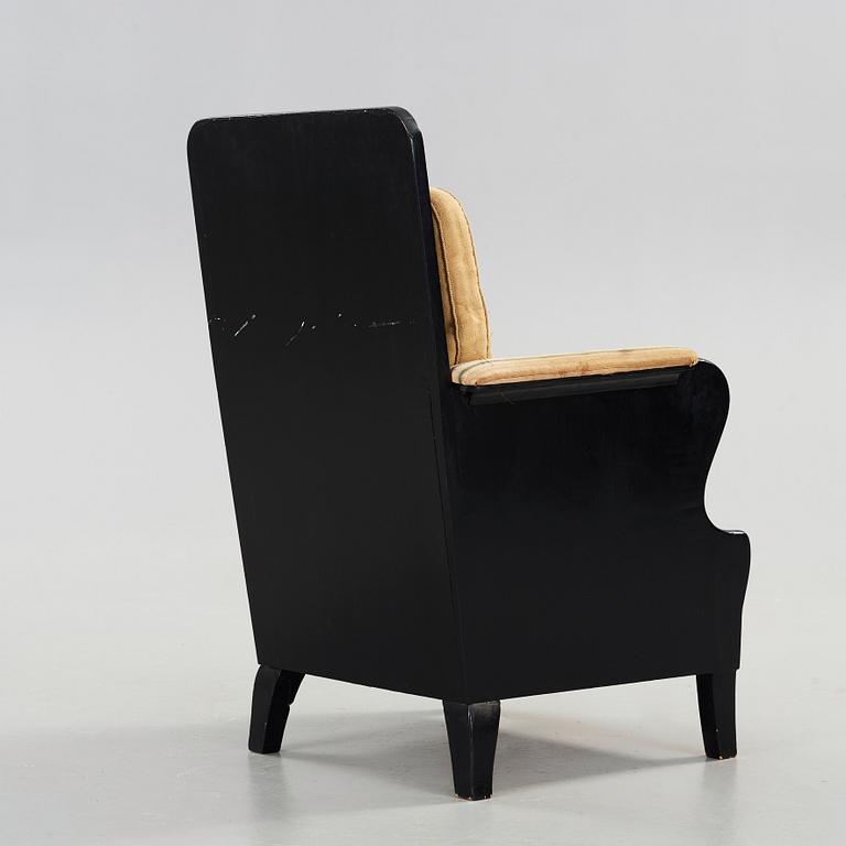 Carl Bergsten, a black lacquered armchair, Nordiska Kompaniet, Sweden ca 1918.