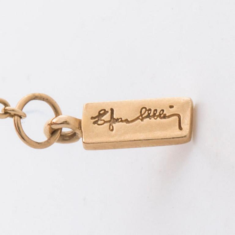 EFVA ATTLING, ARMBAND 18K guld m briljanter 0,12 ct enligt gravyr.