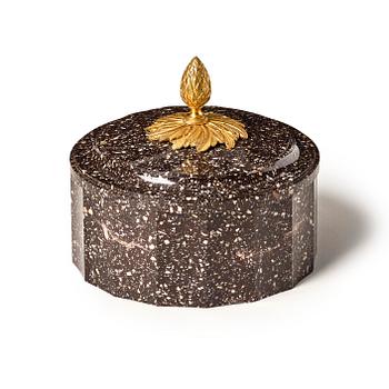 183. A Swedish Empire porphyry butter box with cover, 19th century.