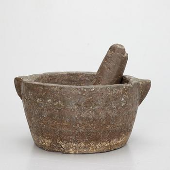 A llimestone mortar and pestle, 18th/19th Century.