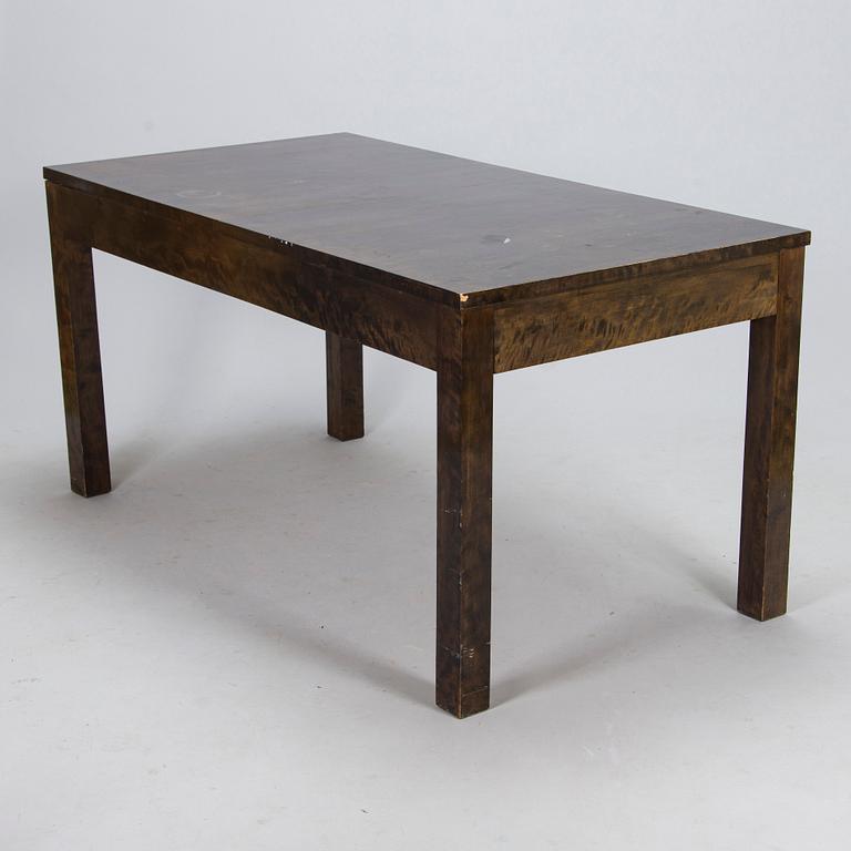 A Finnish 1930s dining table and eight chairs.