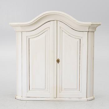 A Swedish rococo hanging cabinet, mid 18th century.