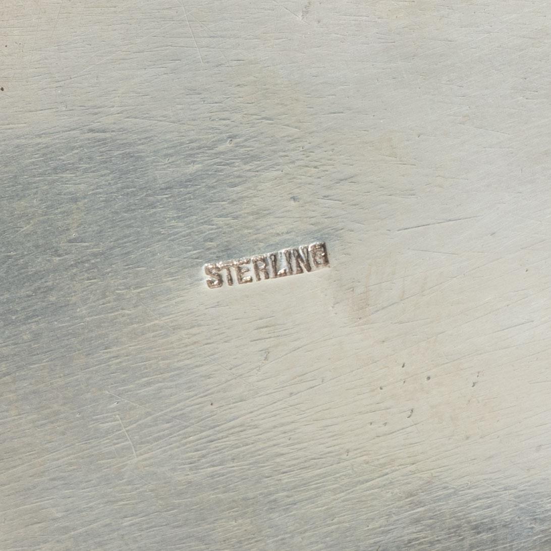 A sterling silver tea caddy, 20th Century.