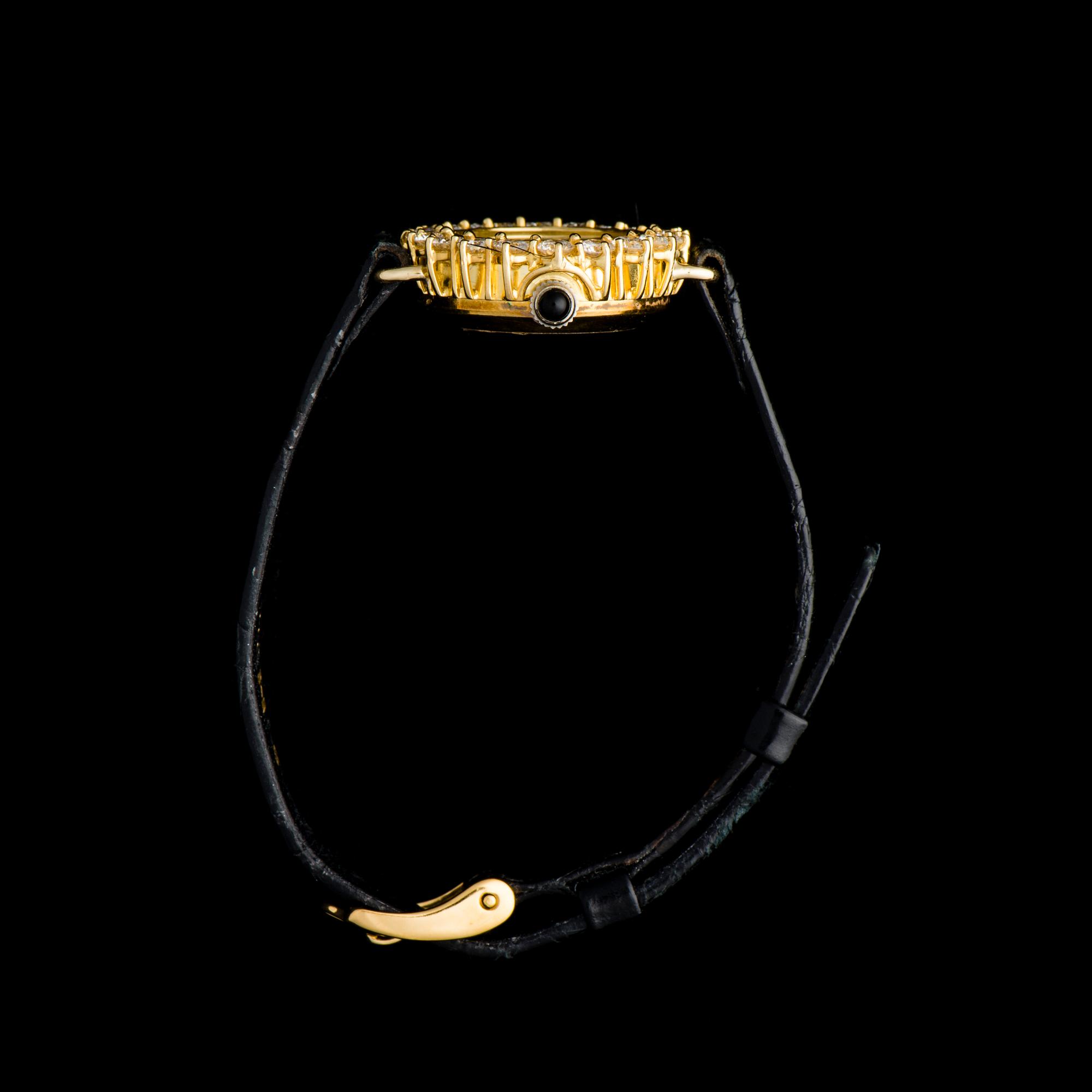 ARMBANDSUR, dam, guld, briljant- och 8/8-slipade diamanter, svart läderarmband.