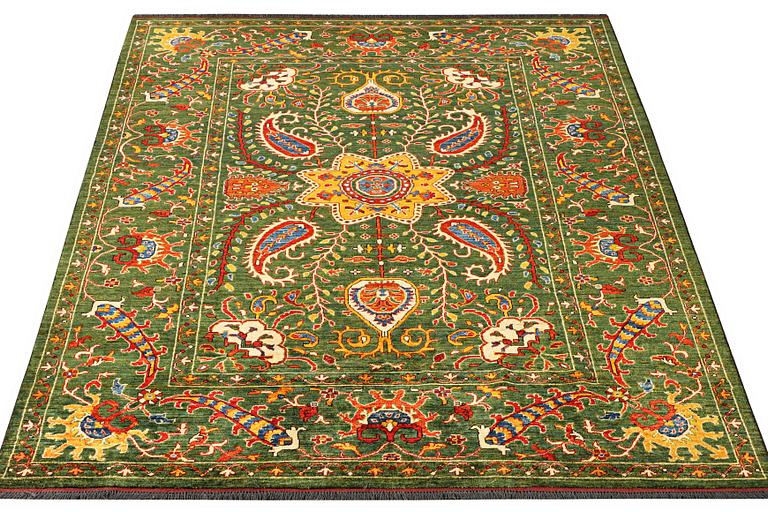 A Kazak carpet, c. 304 x 205 cm.