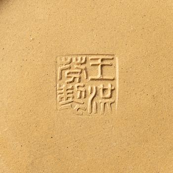 A set of a yellow yixing 'gongfu' teapot and four cups, China, 1980s.