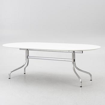 Vico Magistretti, a "Shine" dining table with twelve chairs, De Padova, Italy, around the year 2000.