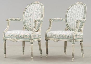 A Louis XVI-style 19th century sofa and a pair of armchairs.