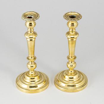 A pair of bronze candlesticks, first half of the 19th century.