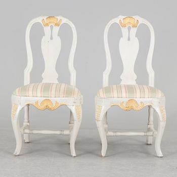 A pair of late 19th century rococo style chairs.