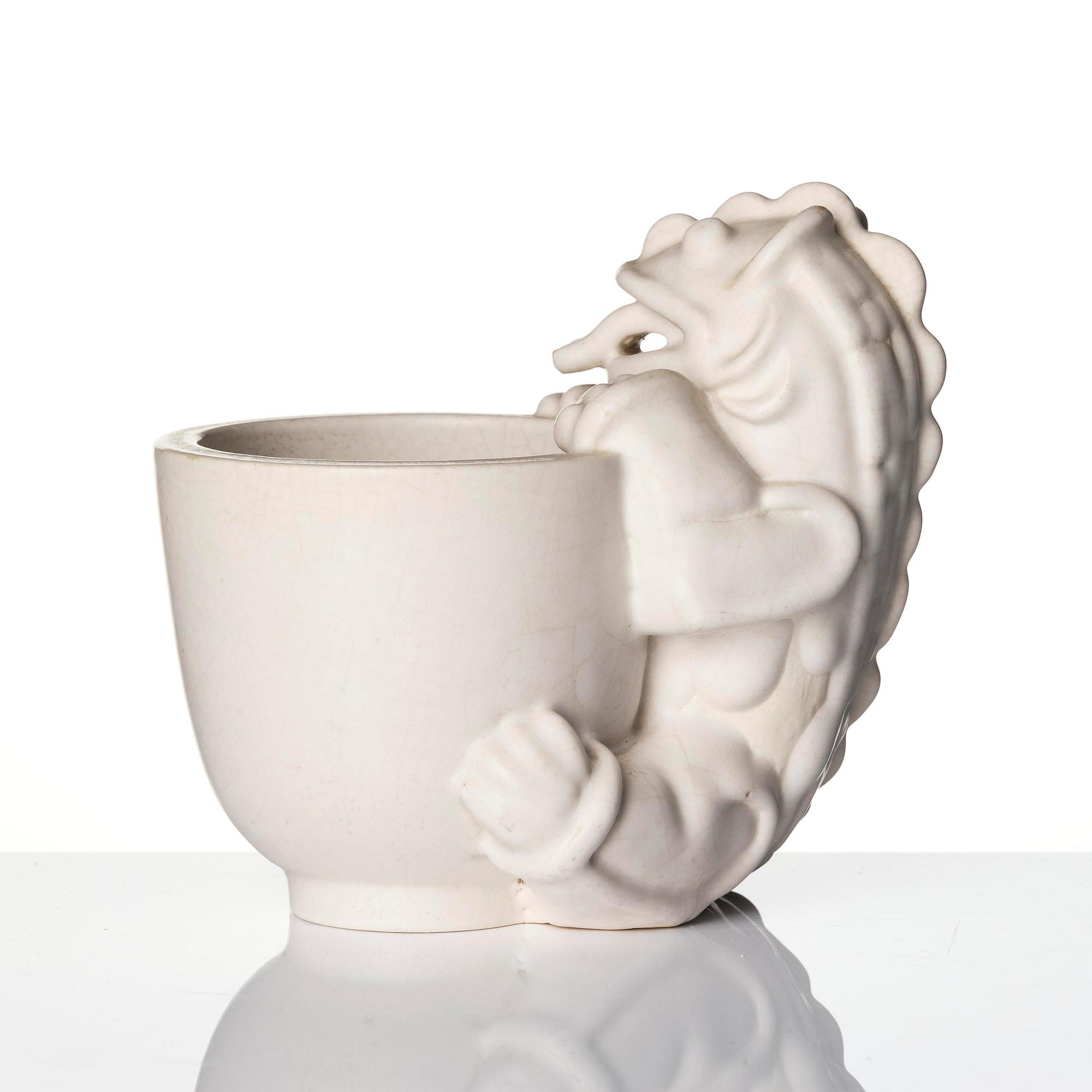 Wilhelm Kåge, a set of two stoneware sculptures of dragon puppies, Gustavsberg, Sweden 1940-50's.