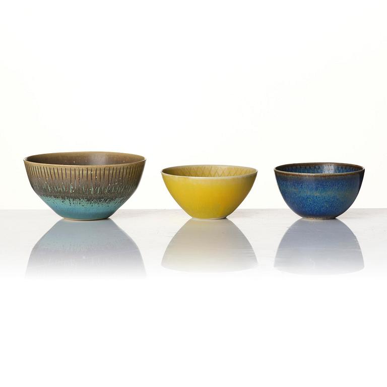 Stig Lindberg, a set of 7 stoneware miniature vases and 5 bowls, Gustavsberg Studio, Sweden, 1955-68.