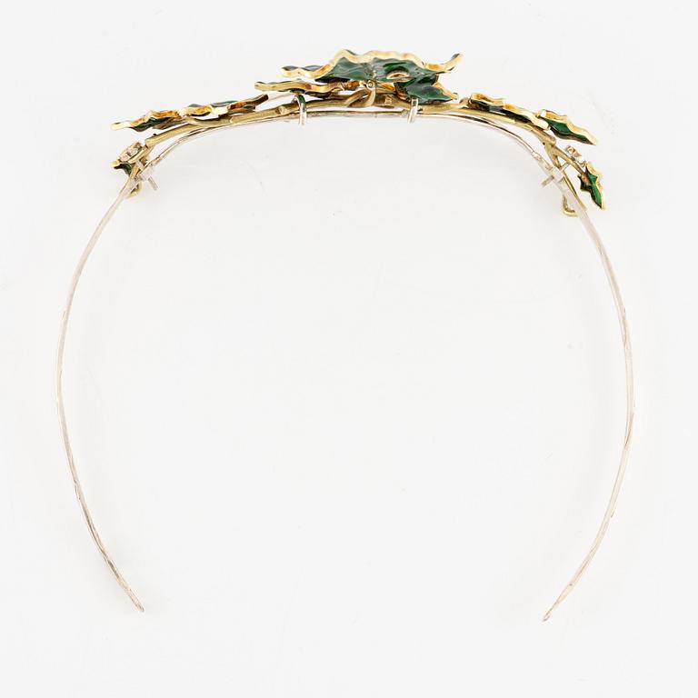 A necklace/tiara combination in 18K gold and green enamel set with old-cut diamonds.