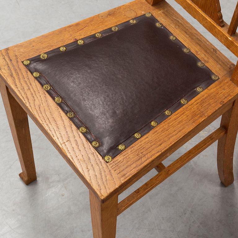 Six early 20th century oak chairs.