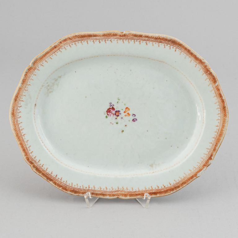 Two famille rose serving dishes and a sauce boat, Qing dynasty, Qianlong (1736-95).