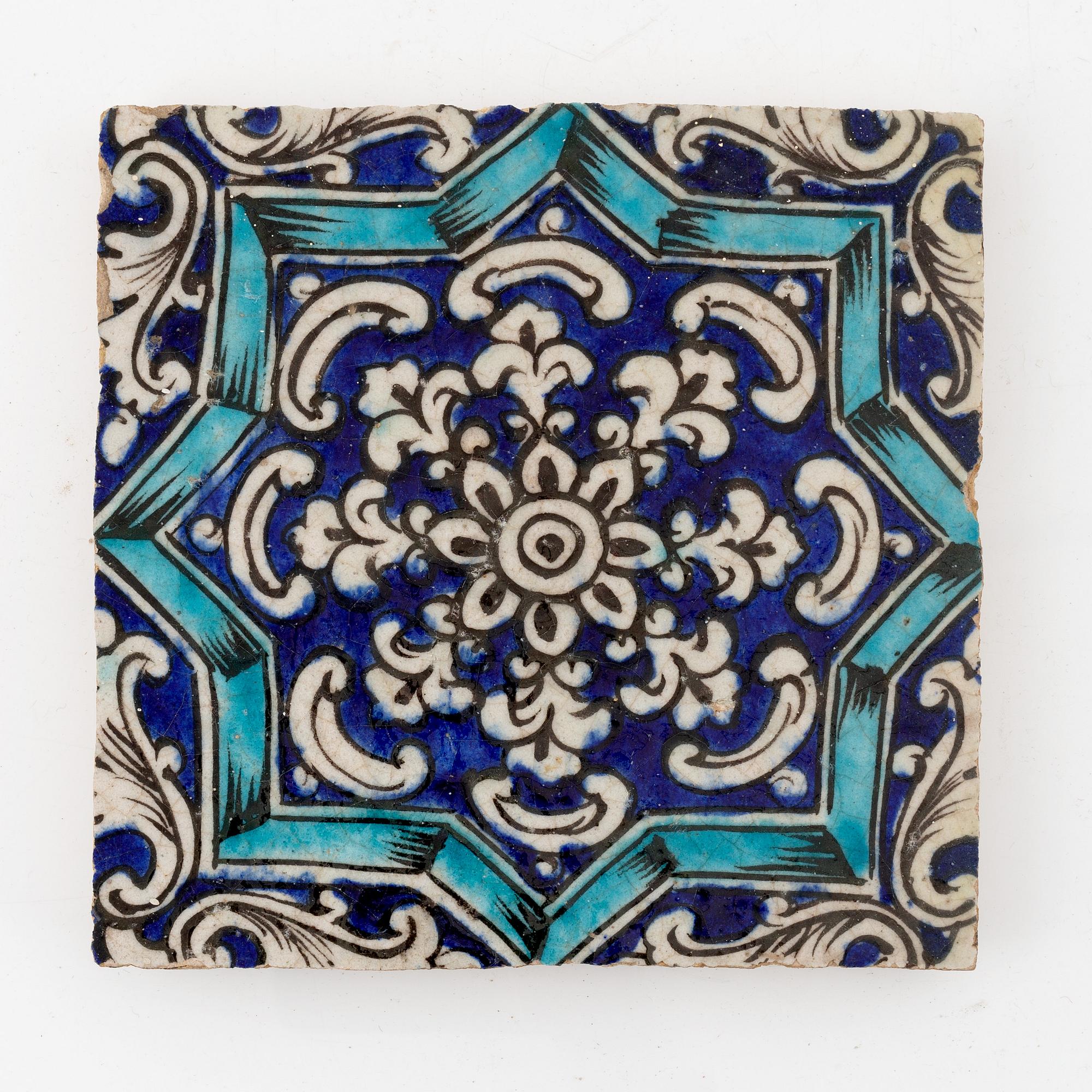 A Persian (Iranian) tile, glazed pottery, Qajar dynasty, 19th century.