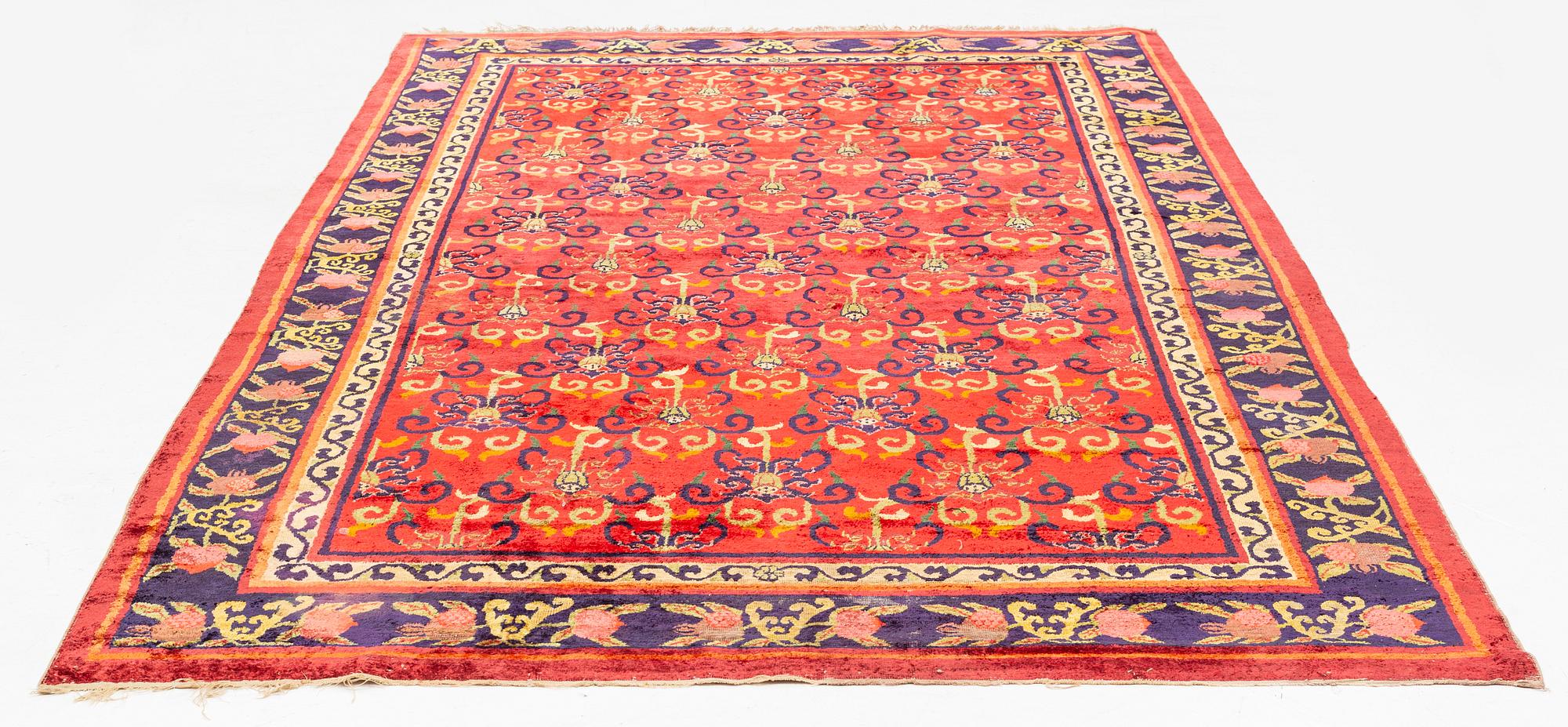 An East Turkestan silk carpet, ca 308 x 182 cm.