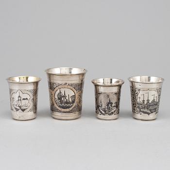 A set of four Russian 19th century silver and niello vodka cups, Moscow.