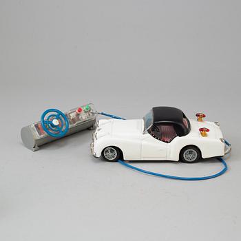 4 toy cars including Bandai and Nomura toys, Japan 1950's-60's.