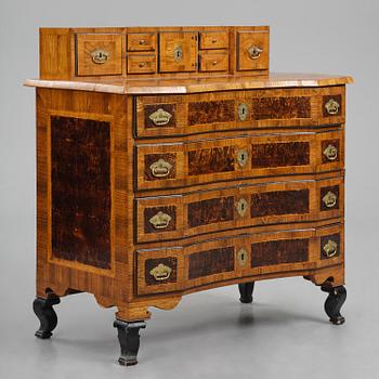 A Swedish late-Baroque burr-alder commode, first part 18th century.