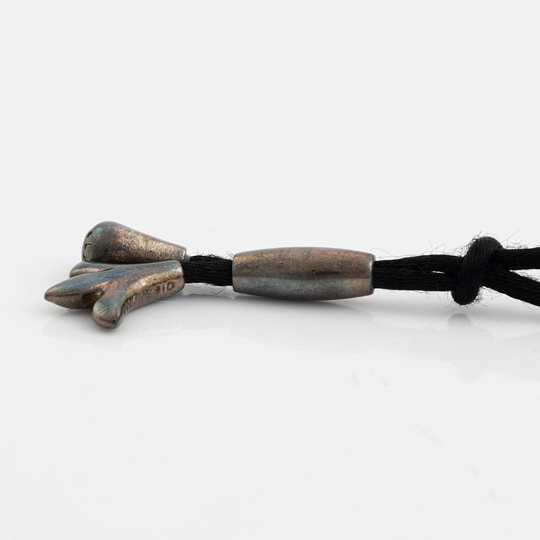 Ole Lynggaard, pendant, silver, with textile.