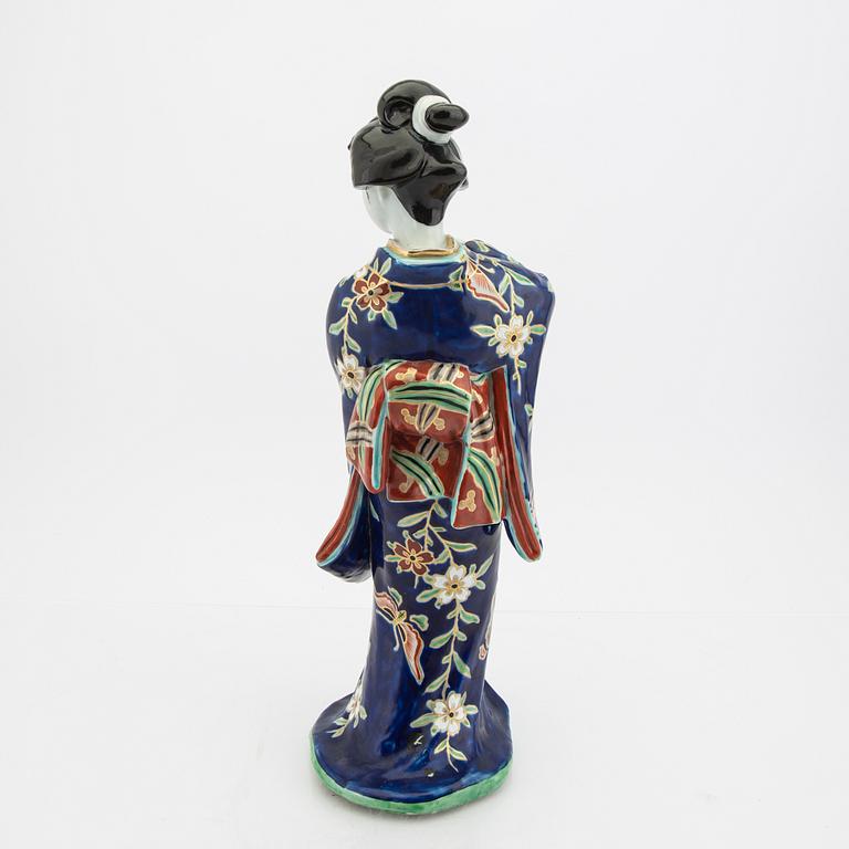 A Japanese porcelain figurine early 1900s.