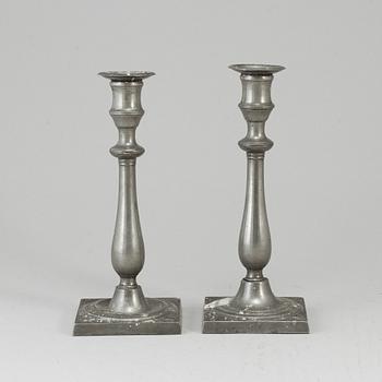 A pair of empire pewter candlesticks, first half of the 19th century.