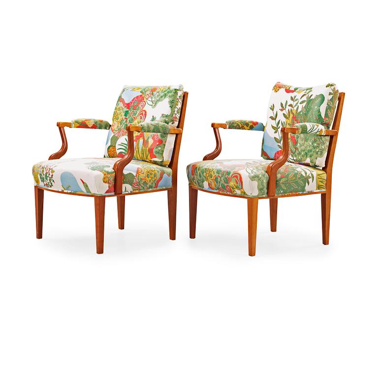 A pair of Josef Frank mahogany and rattan armchairs, Svenskt Tenn, model 969.