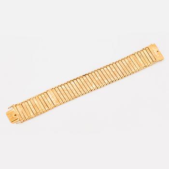 BRACELET, 18K gold with engraved decor.